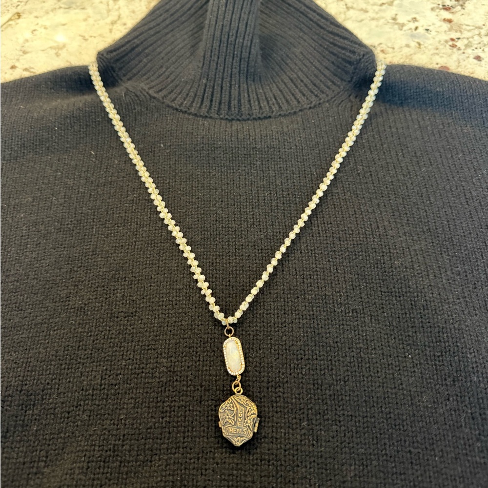 Elegant double braided 2mm white pearl necklace, charm engraved “love hurts”.